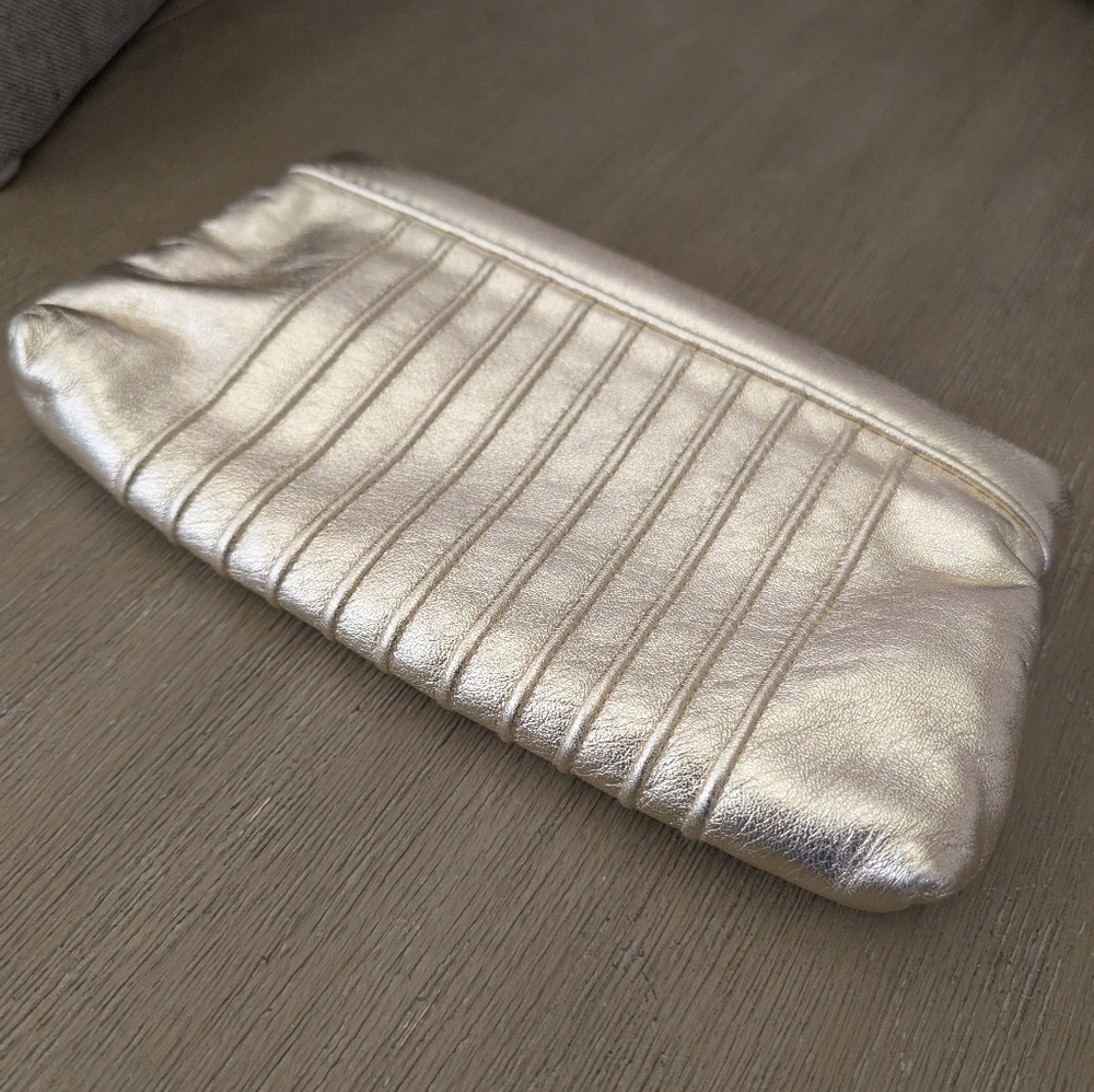 LAUREN MERKIN gold leather clutch